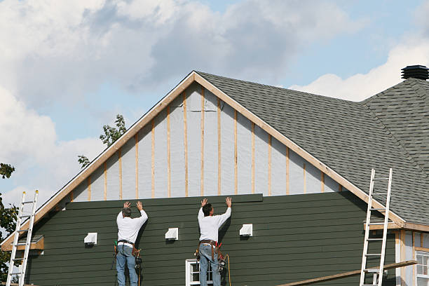 Professional Storm Damage Siding Repair technician working in Dundee, NY